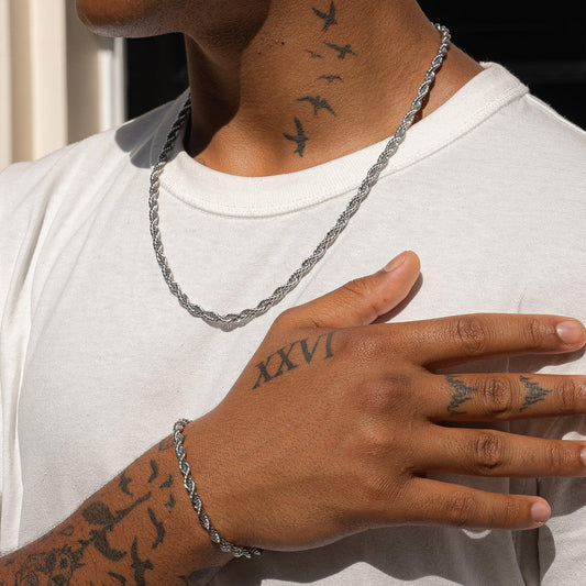 2-piece luxury set: 18K gold-plated 316L steel necklace & bracelet, elegant braided design